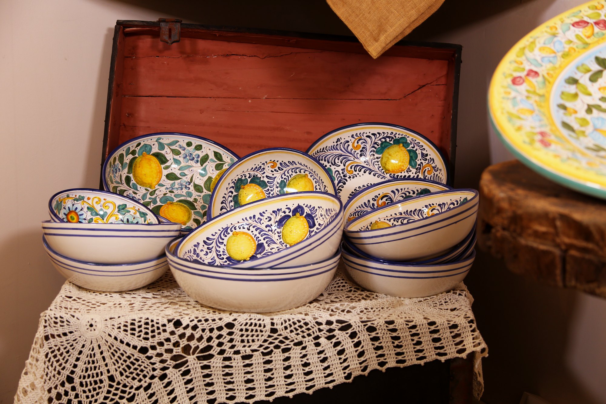 Stacked bowls with the lemon pattern on a crocheted cloth